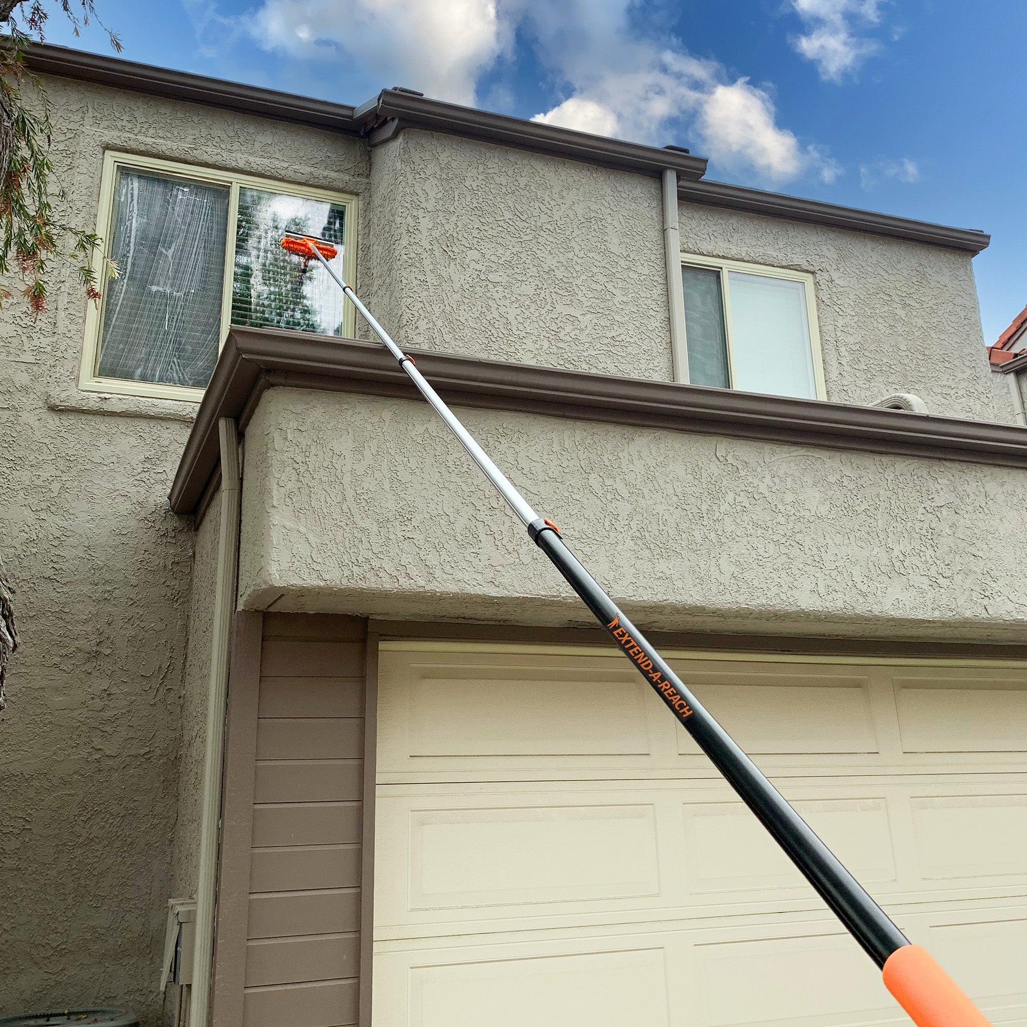 Extend-A-Reach telescoping extension pole in use
