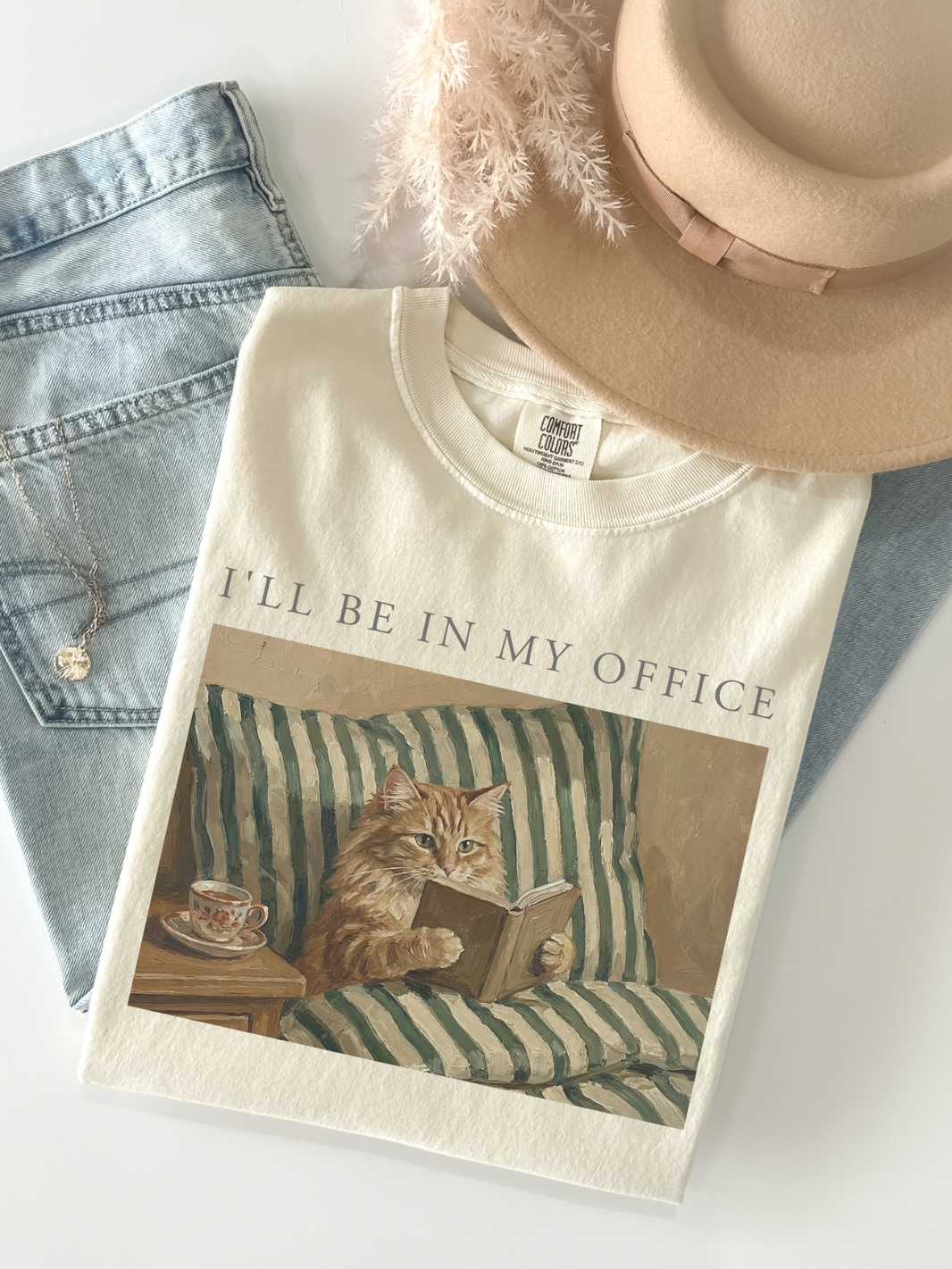 The Library Closet cat-themed reading shirt